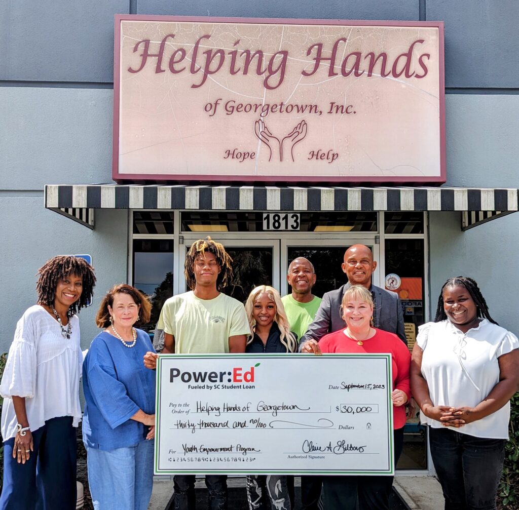 Helping Hands of Georgetown presented check